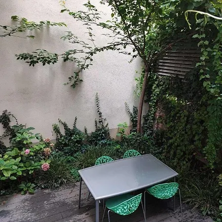 With Unique 40m2 Garden & Self Check In Apartment *