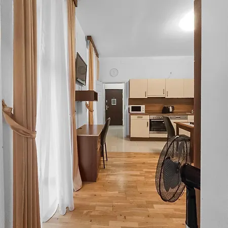 Two-bedroom Balcony Retreat For 4 Near Millennium Tower Apartment